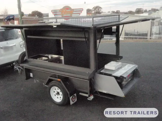 BBQ trailer with the awning out and the servery open — built by Resort Trailers
