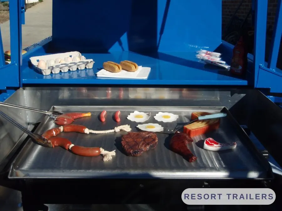 Breakfast on the hotplate of a BBQ trailer — built by Resort Trailers