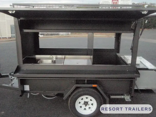 Servery bench and storage inside a BBQ trailer — built by Resort Trailers