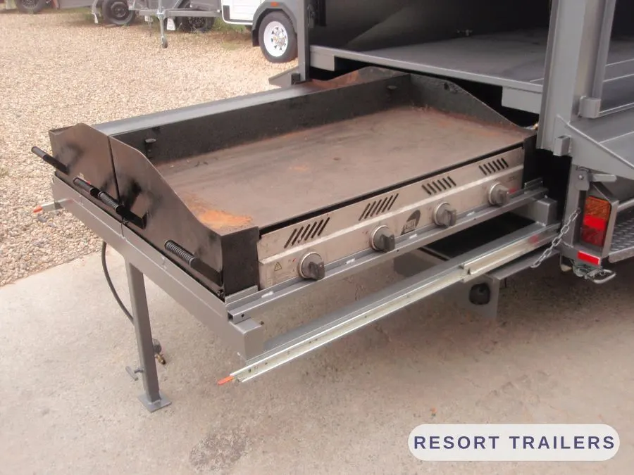 Slide-out six-burner hotplate on a BBQ trailer — built by Resort Trailers