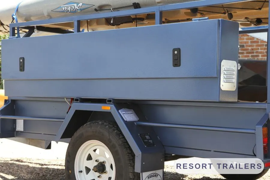 Full-length lockable toolbox along the trailer side — built by Resort Trailers