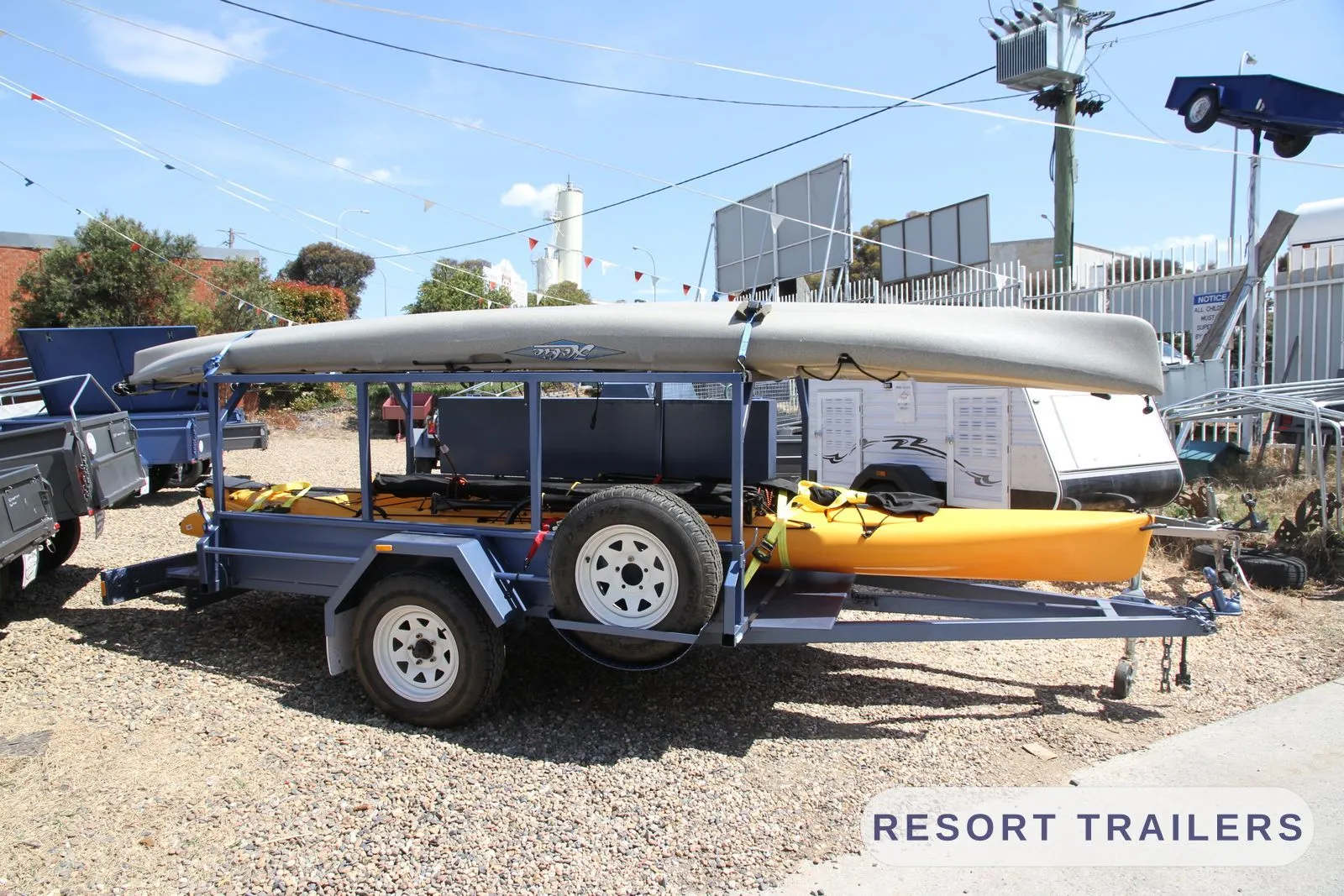 Kayak trailer with an overhead rack and a lockable side toolbox — built by Resort Trailers