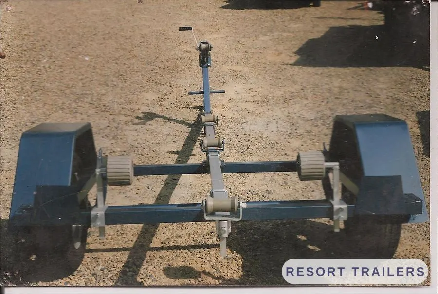 Painted boat trailer frame with rollers and winch post — built by Resort Trailers