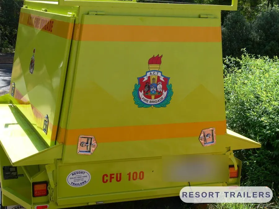 Community fire unit trailer with the canopy lid raised — built by Resort Trailers