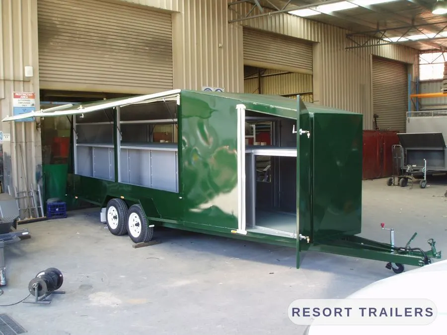 Enclosed club trailer with the shutters opened — built by Resort Trailers