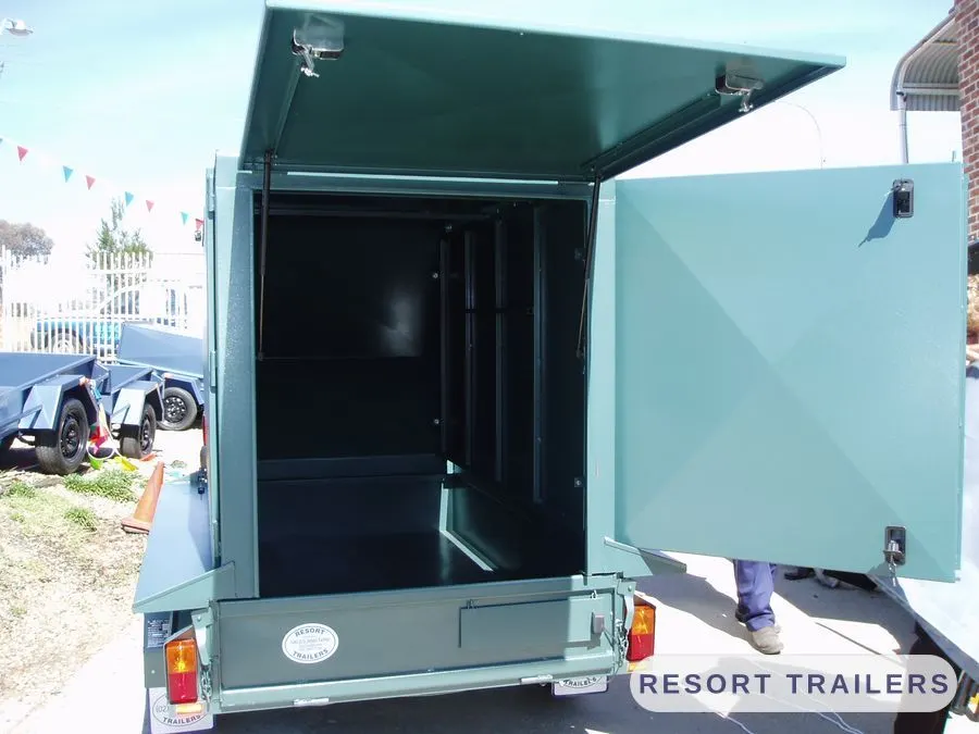 Enclosed trailer with both rear doors open — built by Resort Trailers