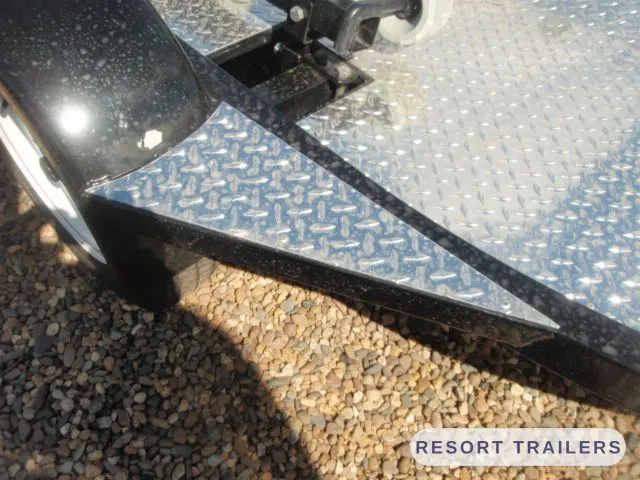 Roller bunks and black mudguard on the jet ski trailer — built by Resort Trailers