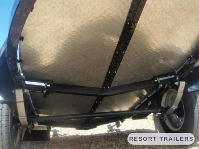 Shaped checker-plate deck from underneath — built by Resort Trailers