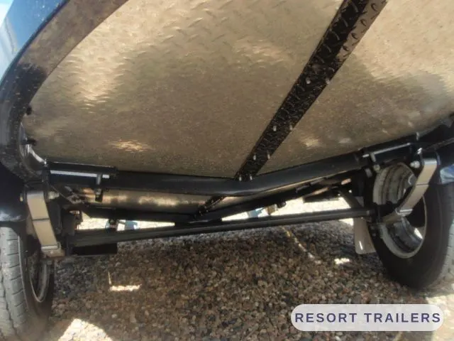 Underside of the shaped deck and axle — built by Resort Trailers
