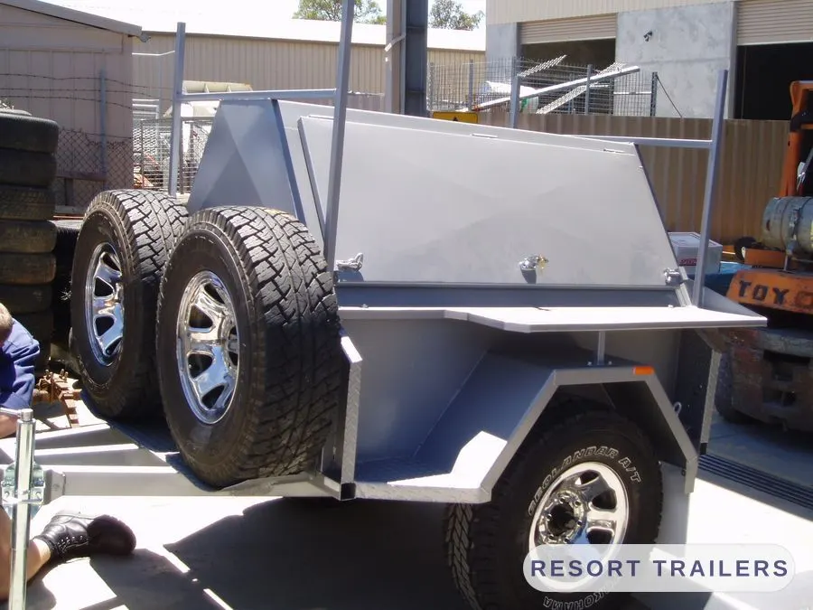 Tandem off-road trailer with lift-up canopy — built by Resort Trailers