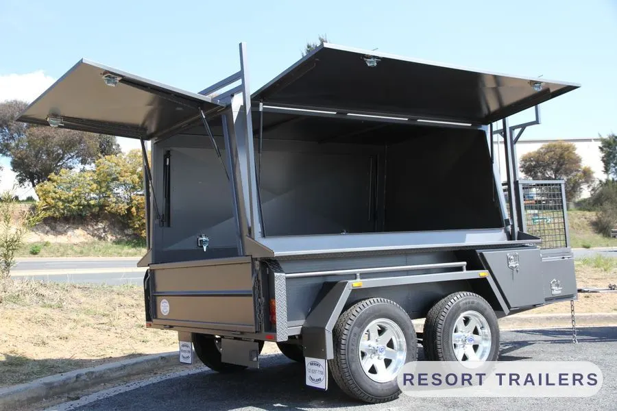 Tandem tradie canopy with both gull-wing lids open — built by Resort Trailers
