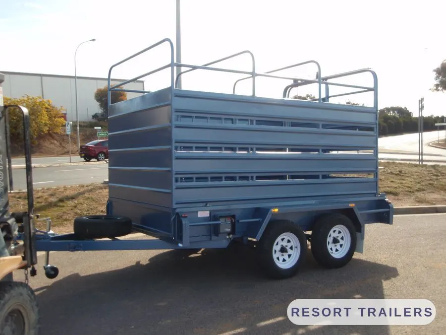Full side profile of a tandem stock crate — built by Resort Trailers