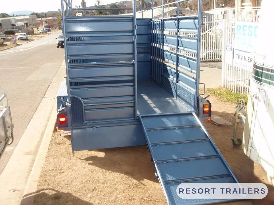 Stock crate with the loading ramp down — built by Resort Trailers