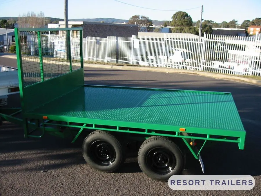 Green table top with a checker-plate deck — built by Resort Trailers