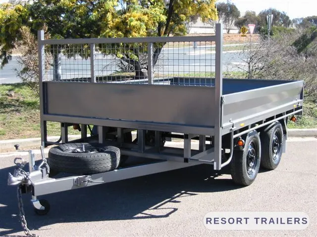 Table top with a mesh headboard and twin spare wheels — built by Resort Trailers