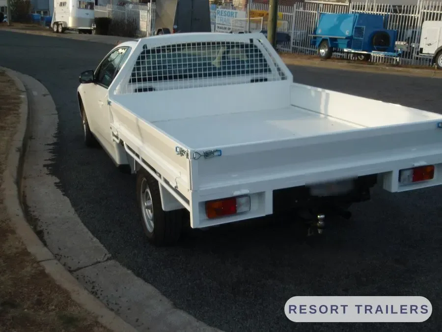 Flat steel tray on a single cab ute — built by Resort Trailers